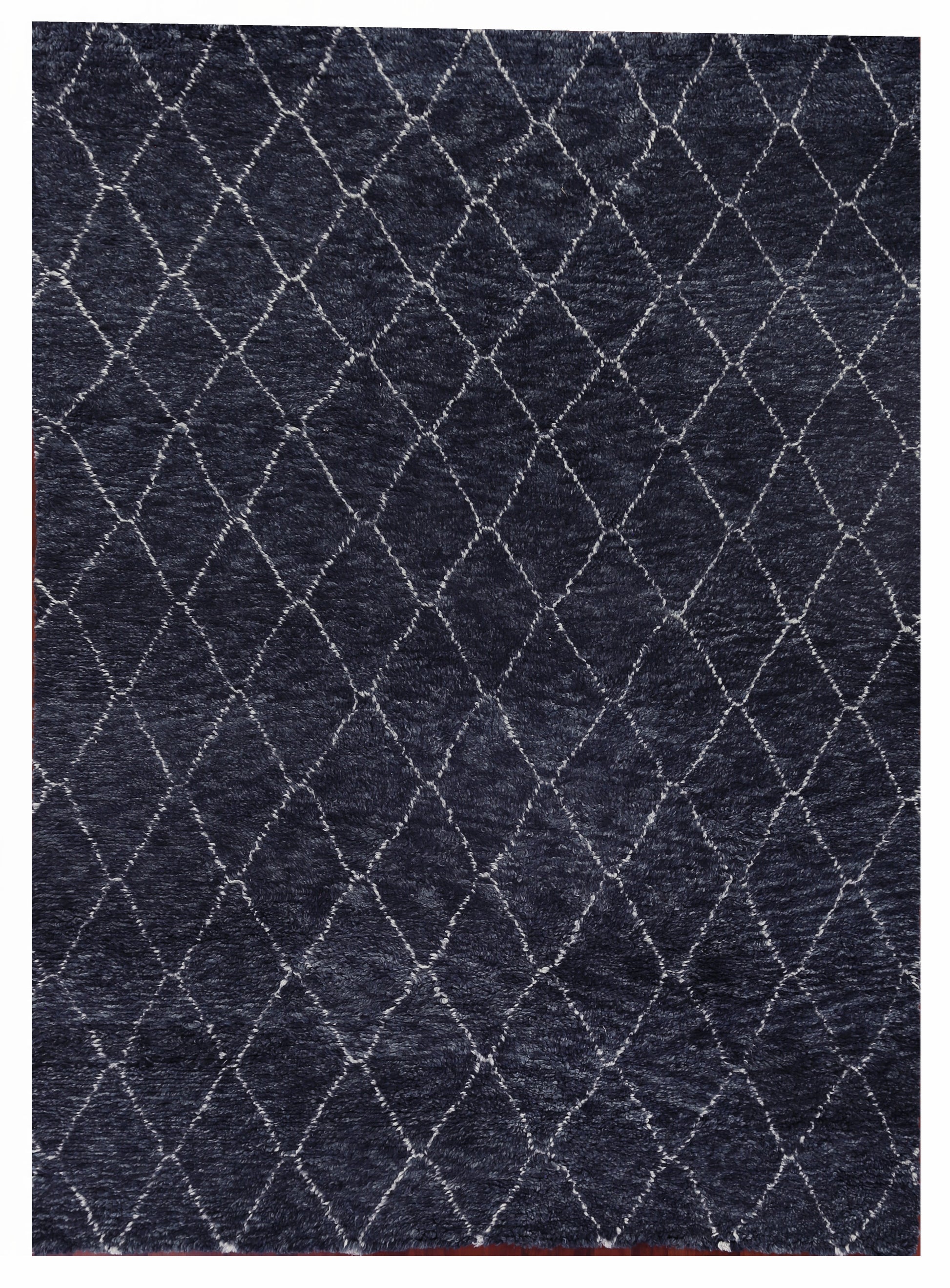 Dark navy rug with a light silver-gray diamond lattice pattern, rectangular plush texture, modern geometric style.