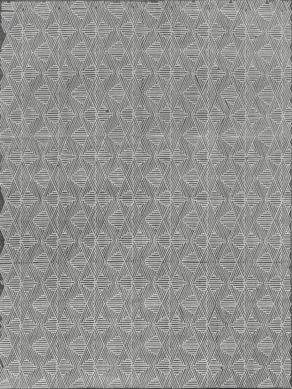Grey flat-weave rug with a white repeating diamond and triangle pattern; indoor use.