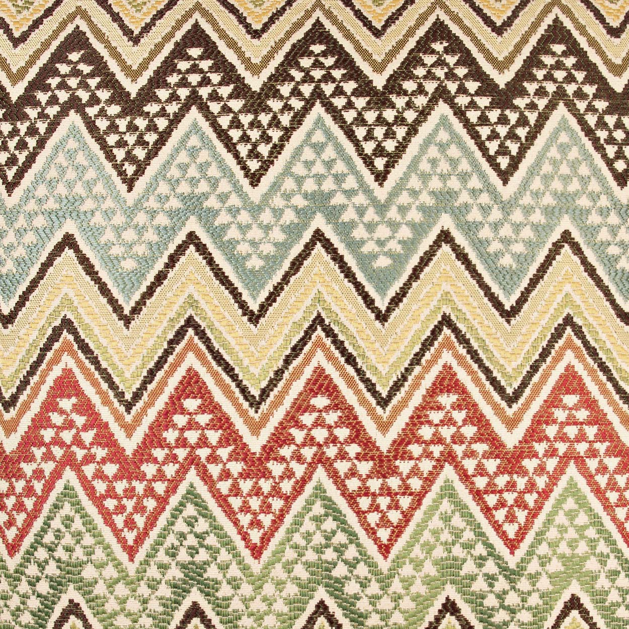 Multicolor chevron woven fabric with zigzag stripes and small triangle motifs in brown, cream, blue, yellow, red and green.