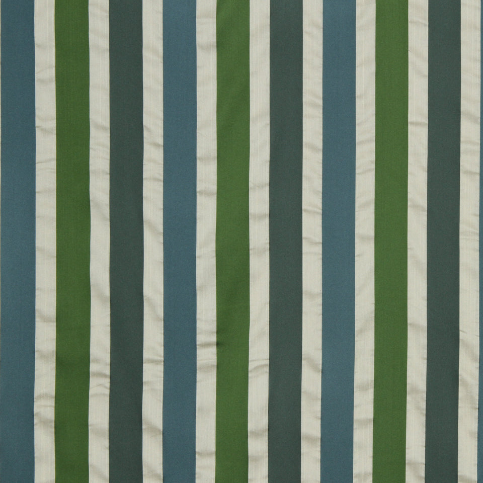Vertical striped fabric in blue, teal, sage green and cream hues; modern textile pattern.