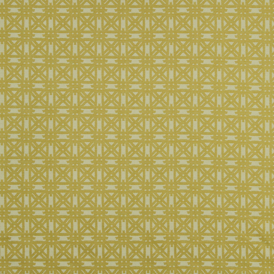 Gold geometric lattice pattern on warm beige upholstery fabric.
