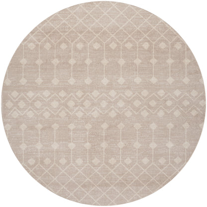 Round beige rug with subtle white geometric diamond lattice pattern and soft woven texture.
