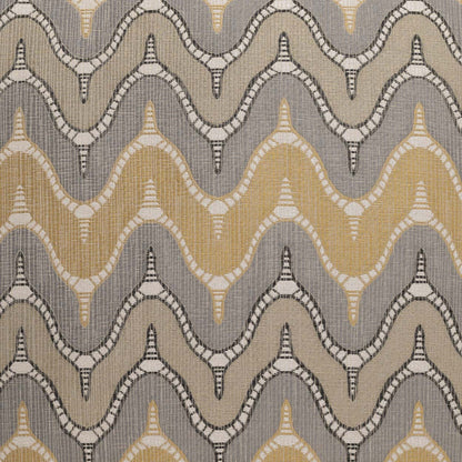 Grey chevron pillow with gold, beige and cream accents; scalloped chevron pattern; jacquard weave, 24 x 24.