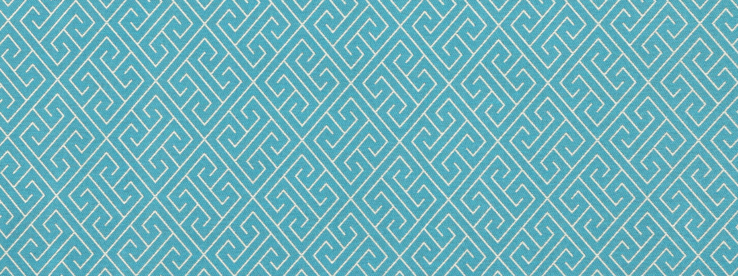 Turquoise upholstery fabric with a repeating white Greek key meander pattern.