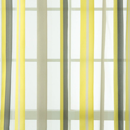 Yellow, gray, and off-white striped sheer curtains framing a window.