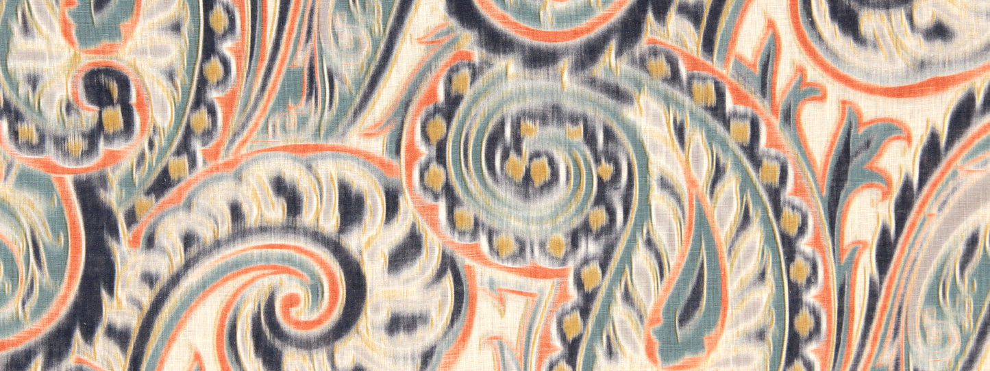 Paisley-pattern fabric in teal, blue, and orange on cream with intricate swirls and leaf motifs.