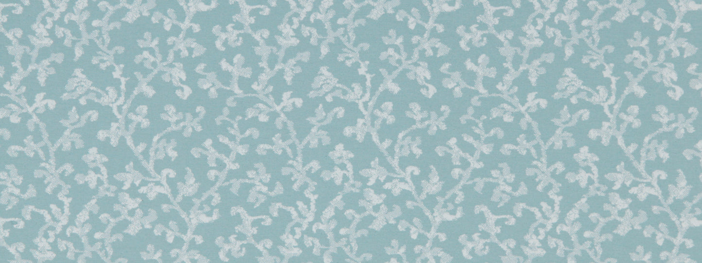 Soft blue upholstery fabric with delicate white scrolling floral vine pattern.