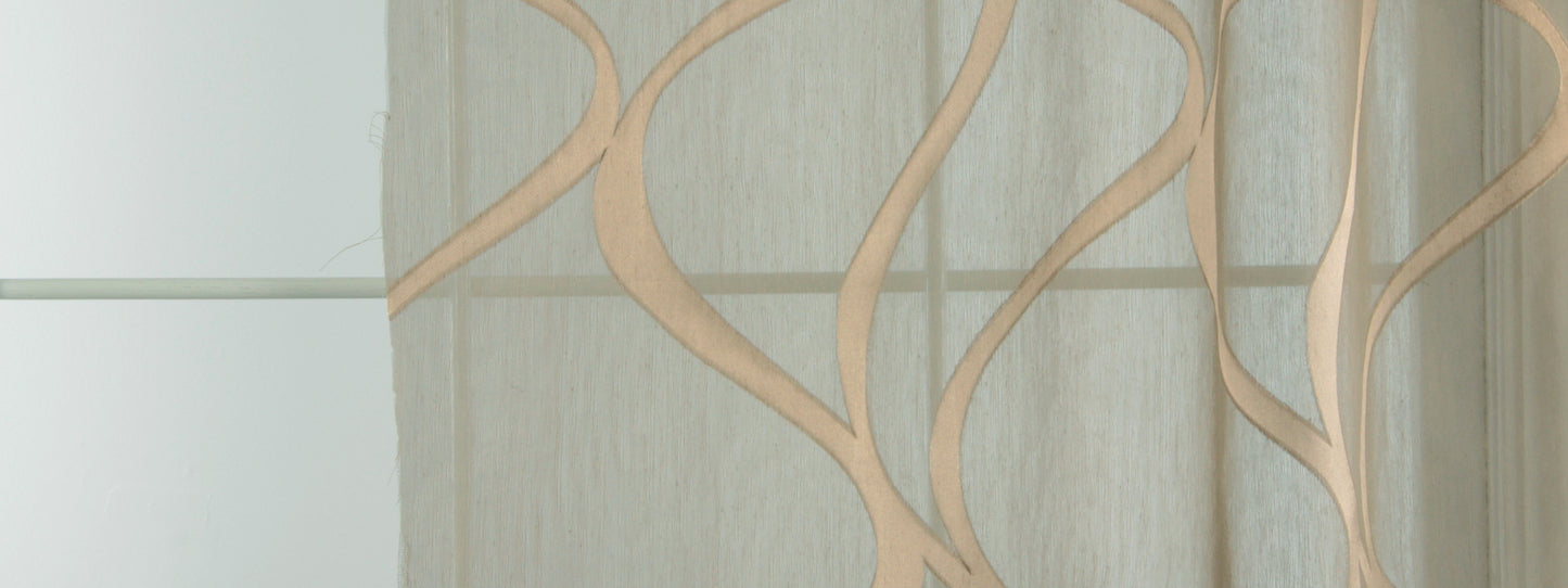 Light gray fabric curtain with taupe wavy vine pattern, modern decorative window drape.