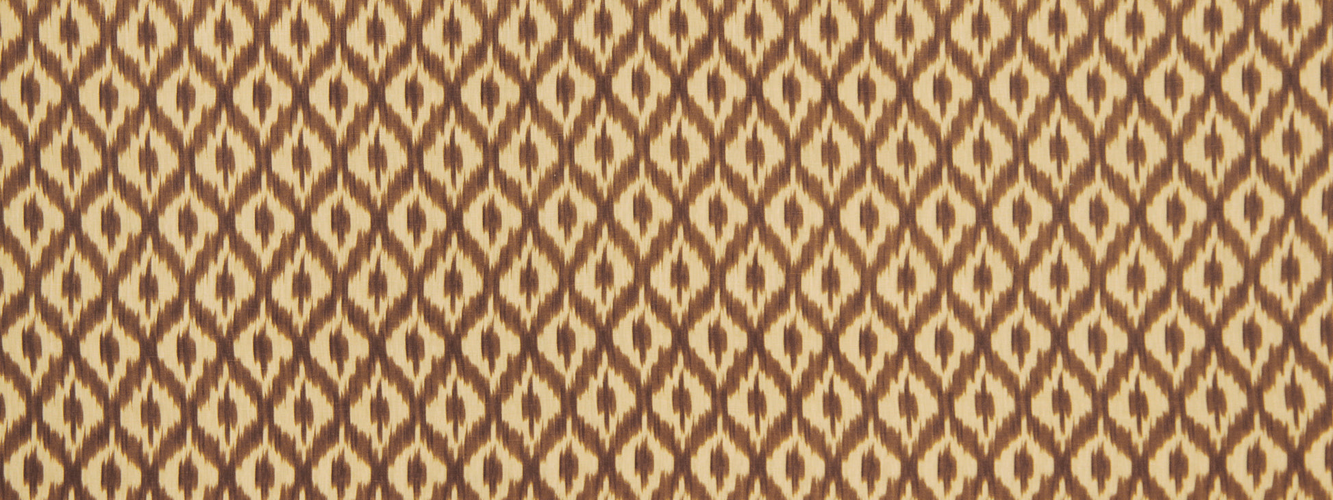 Tan and brown diamond lattice pattern fabric texture, warm geometric motif for upholstery or home decor.