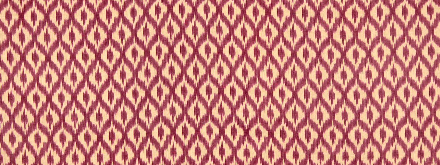 Maroon & cream woven fabric with repeating diamond lattice pattern, upholstery textile.