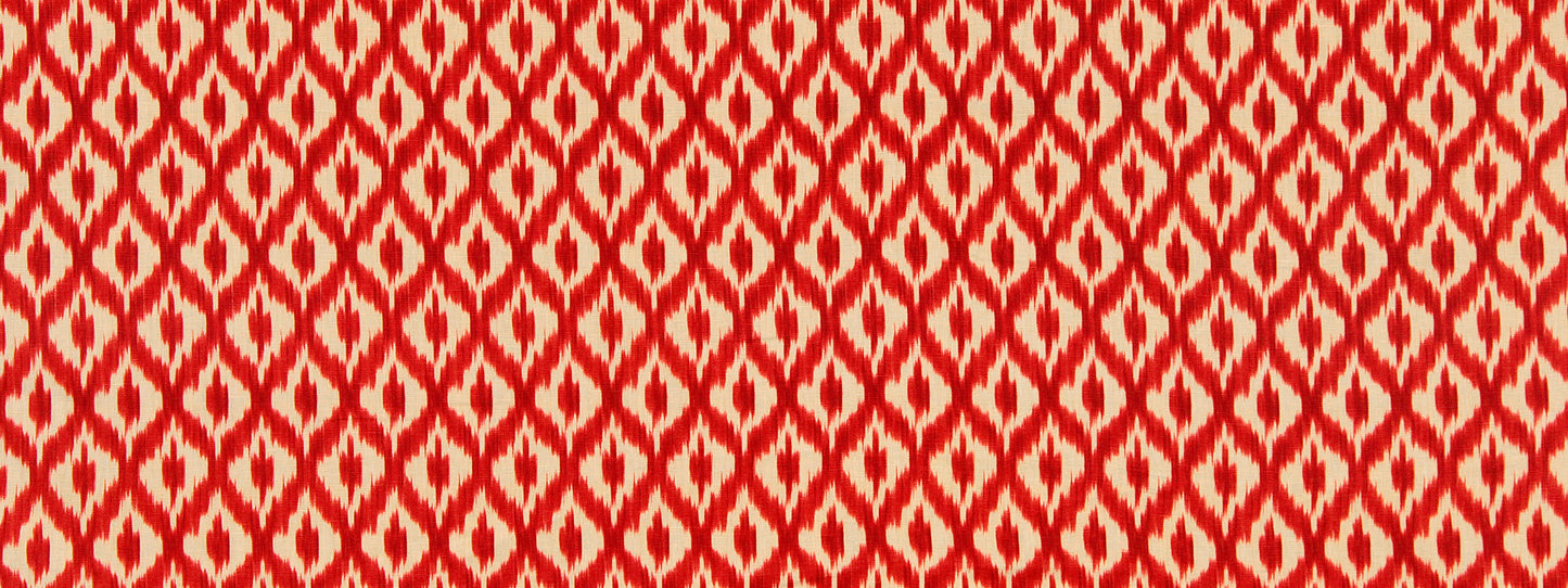 Red and white ikat-inspired geometric diamond pattern fabric.