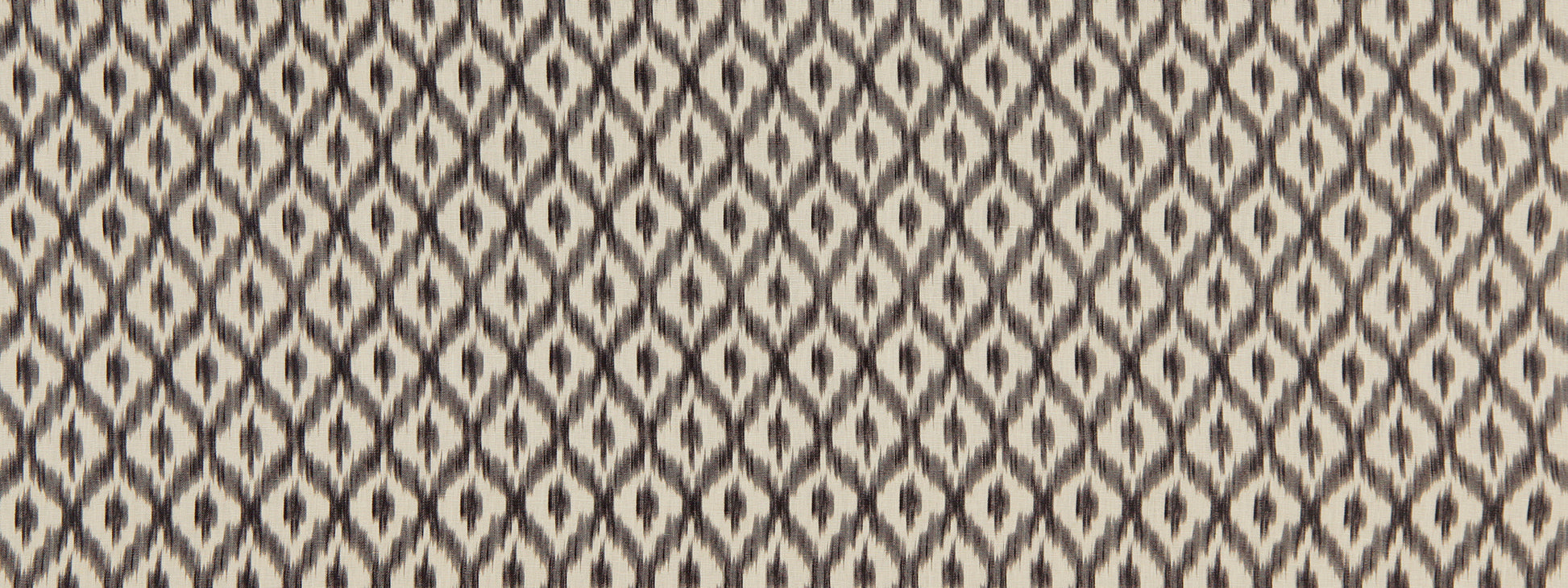 Grey fabric upholstery with a navy diamond lattice jacquard pattern.