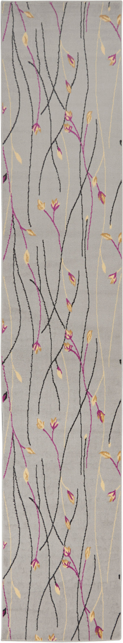 Long rectangular rug runner in gray with abstract black, pink, and yellow vine lines and small leaves.