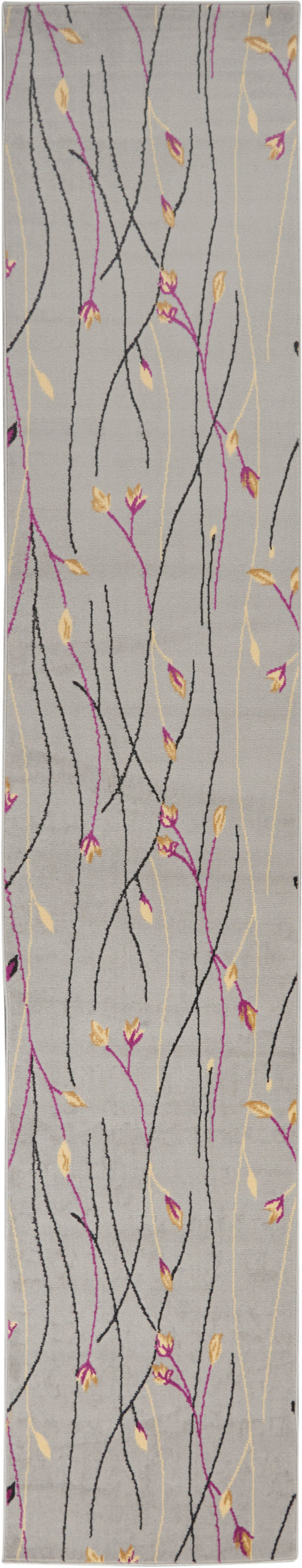 Long rectangular rug runner in gray with abstract black, pink, and yellow vine lines and small leaves.