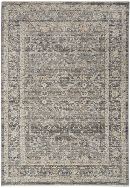 Distressed grey-blue oriental area rug with ivory-beige floral border and central medallion.