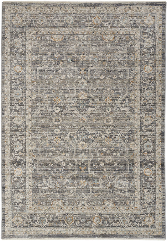 Distressed grey-blue oriental area rug with ivory-beige floral border and central medallion.
