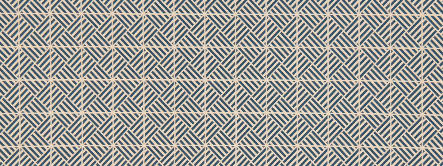 Cobalt blue upholstery fabric with a triangulation geometric pattern and cream accents.