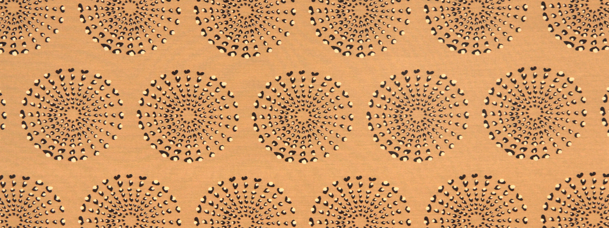 Orange background with repeating black sunburst dotted circles; retro geometric pattern.