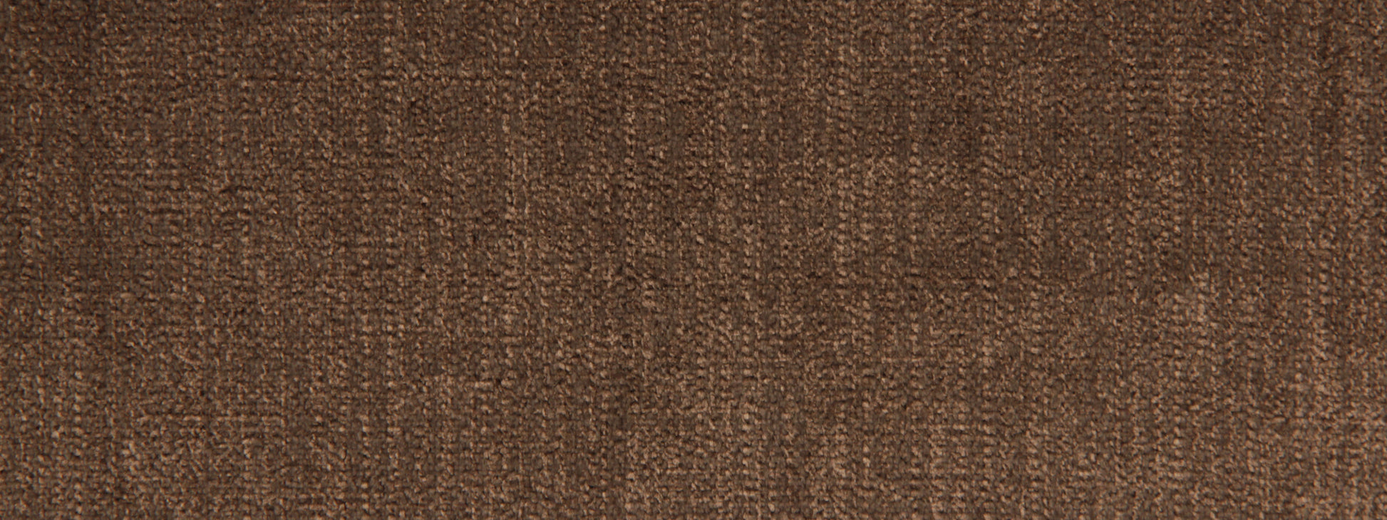 Close-up of brown woven fabric with textured upholstery-grade surface in earthy tones.