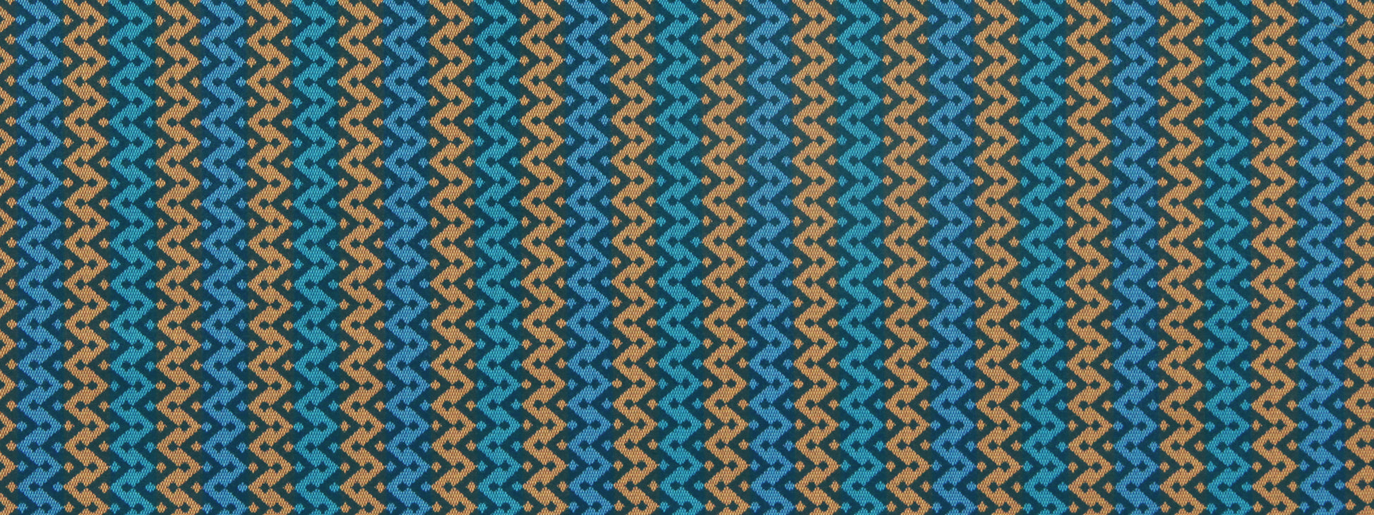 Woven fabric with teal, blue, and tan chevron zigzag pattern; geometric textile suitable for upholstery or apparel.