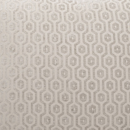 Grey geometric pillow with an interlocking octagon lattice pattern and subtle woven texture.