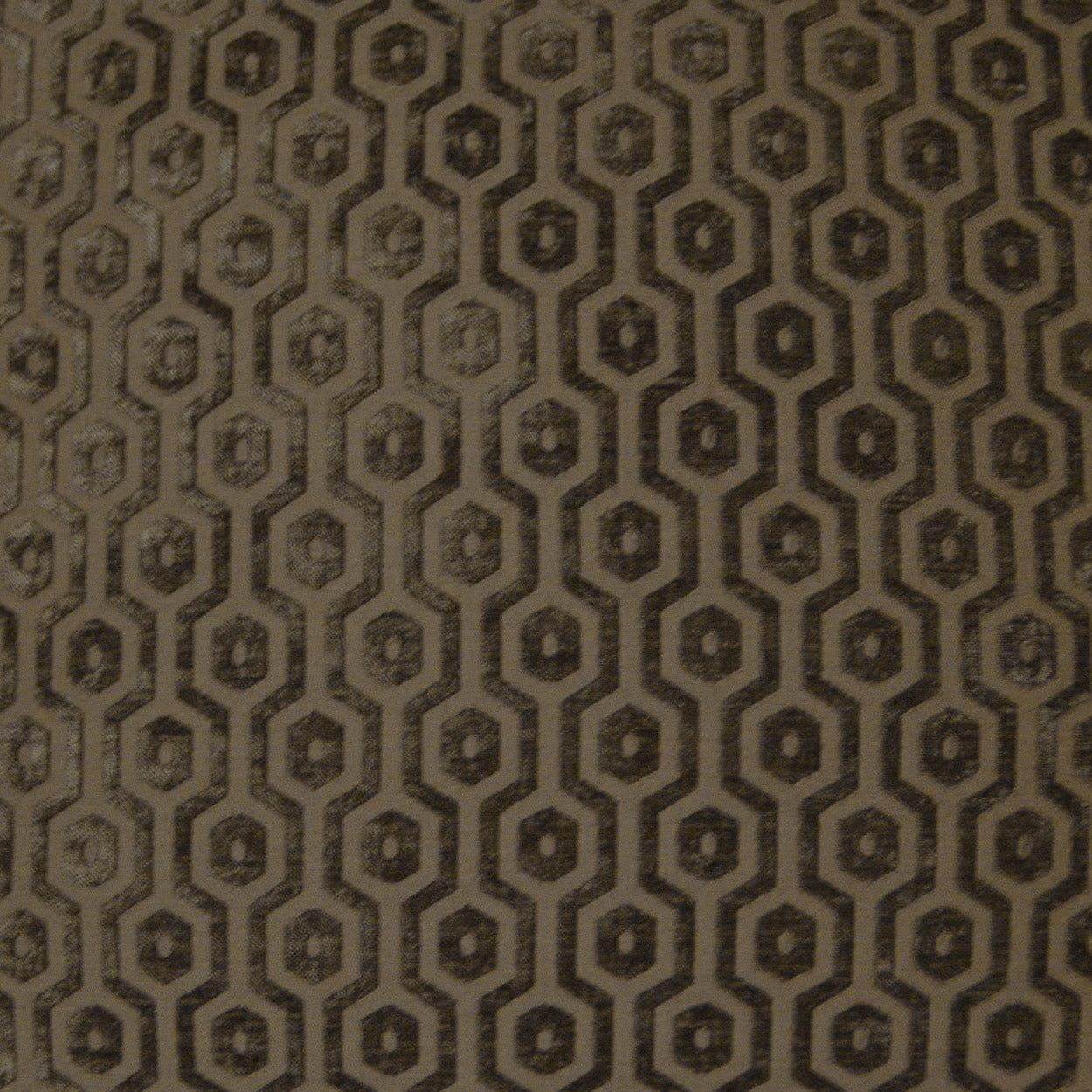 Taupe-brown pillow with a mocha geometric hexagon pattern and subtle woven texture, 24" x 24