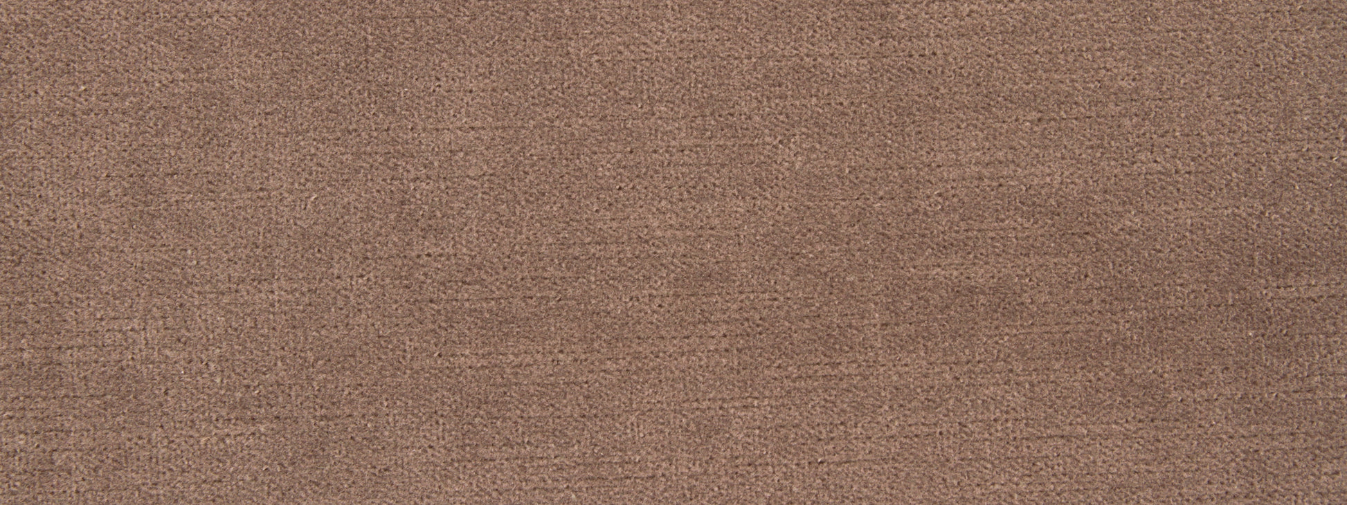 Close-up of brown woven upholstery fabric texture with visible fibers and subtle grain.
