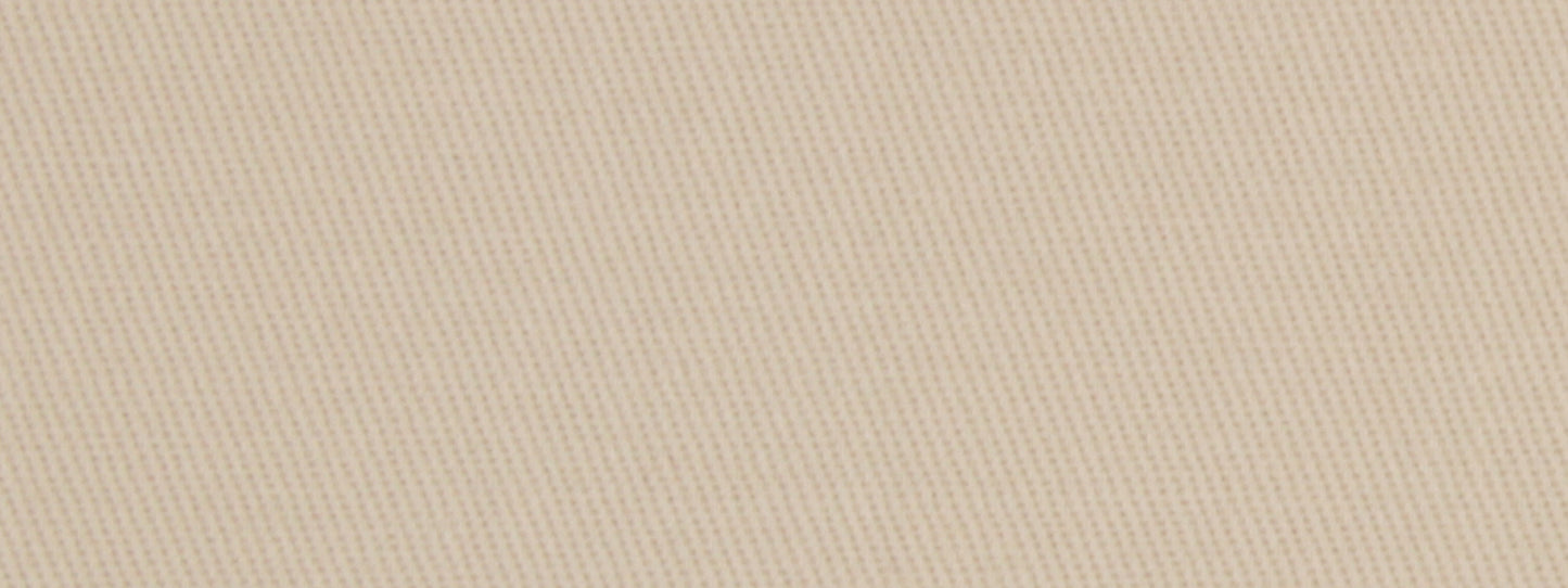 Beige twill fabric close-up with diagonal rib texture; neutral textile suitable for apparel or upholstery.