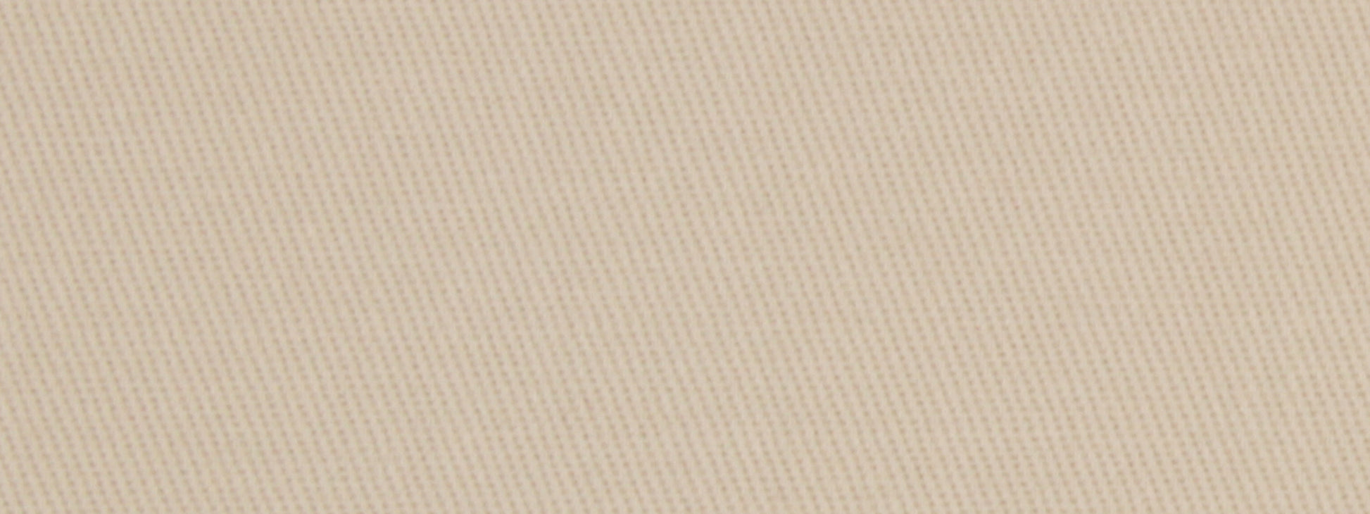Beige twill fabric close-up with diagonal rib texture; neutral textile suitable for apparel or upholstery.