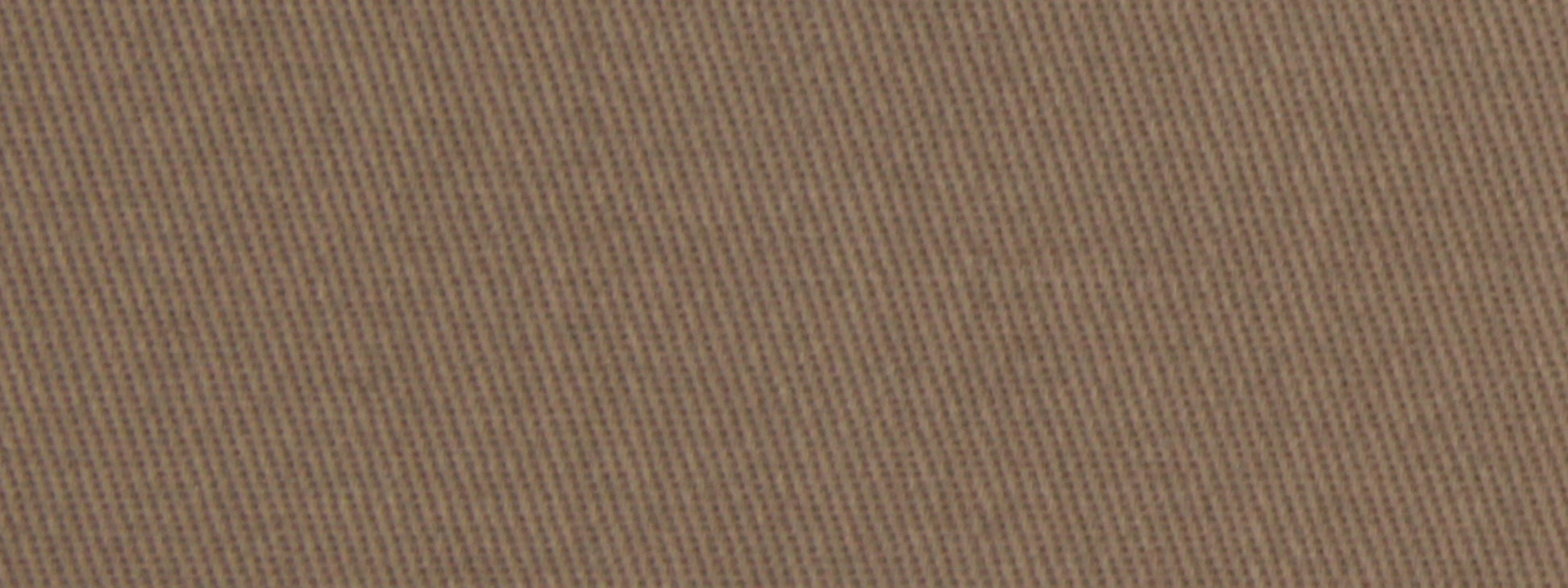 Close-up of warm brown cotton twill upholstery fabric with diagonal weave texture.