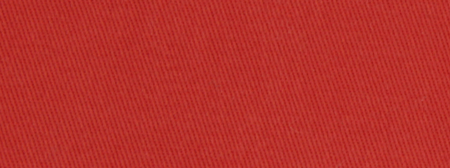 Close-up of red cotton twill fabric texture with diagonal weave and scarlet color, upholstery fabric.