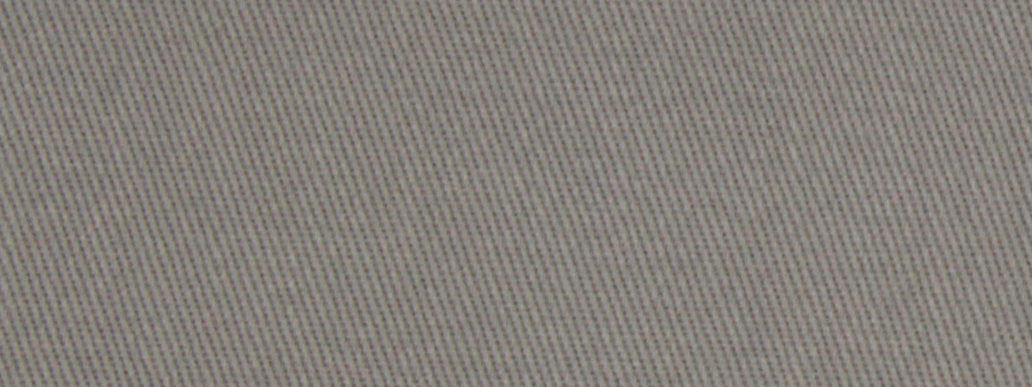 Close-up of light gray twill fabric texture with diagonal weave, a durable woven textile.