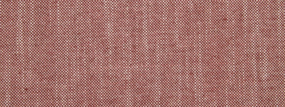 Close-up of crimson linen canvas upholstery fabric with a coarse weave and visible threads.