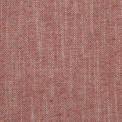 Close-up of red-crimson linen canvas upholstery fabric with a subtle weave and tiny white flecks.