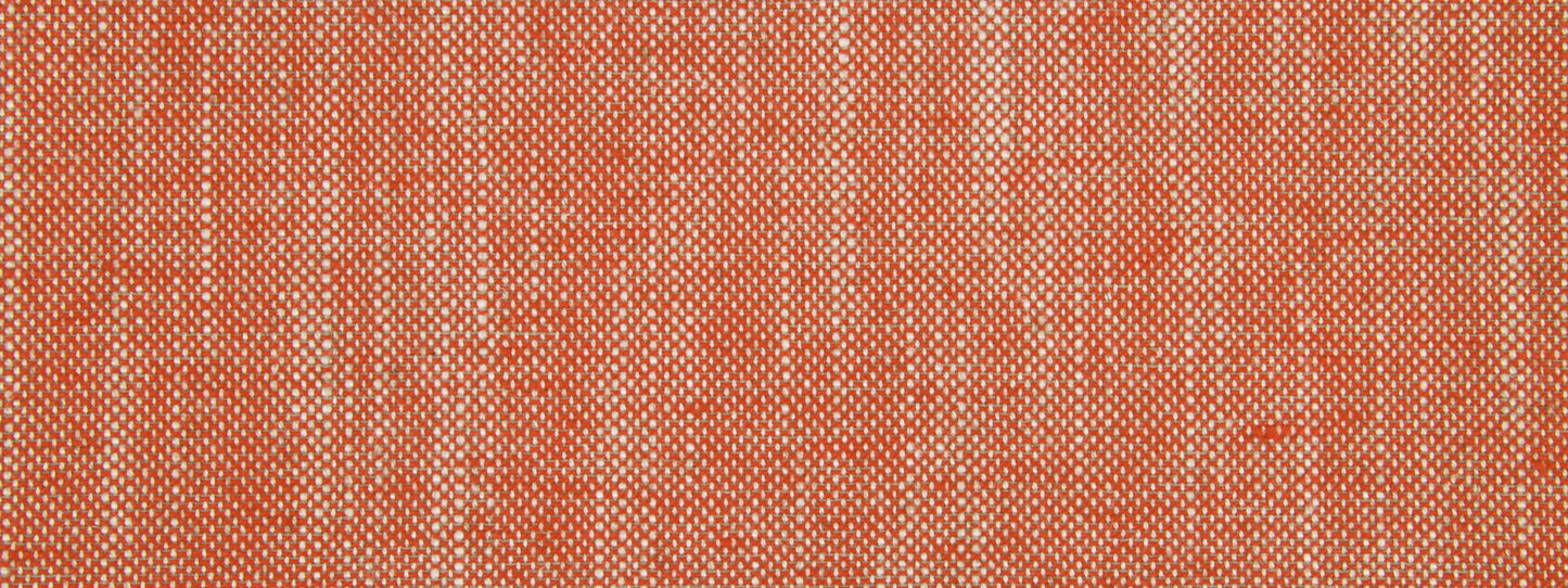 Close-up of orange woven fabric with white flecks, textured speckled textile.