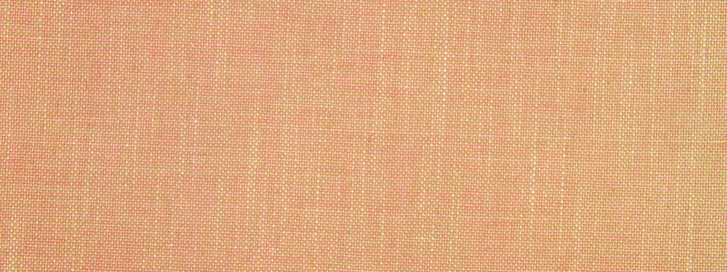Peach-toned woven fabric close-up showing a linen-like texture and subtle gradient.