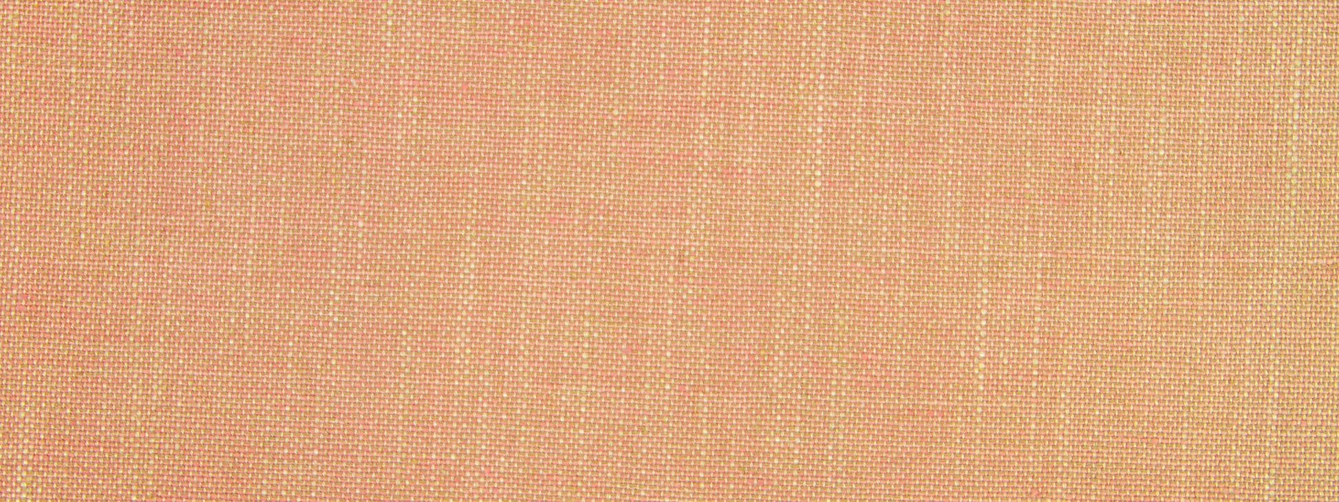 Peach-toned woven fabric close-up showing a linen-like texture and subtle gradient.