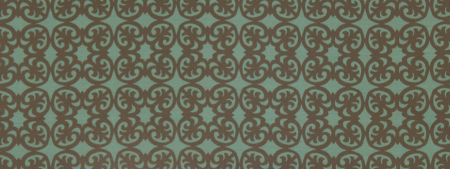 Teal background with a repeating brown damask scroll pattern on upholstery fabric.