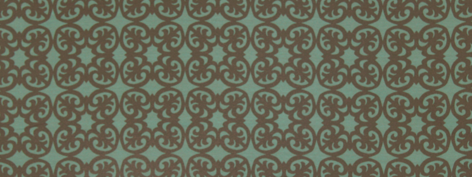 Teal background with a repeating brown damask scroll pattern on upholstery fabric.