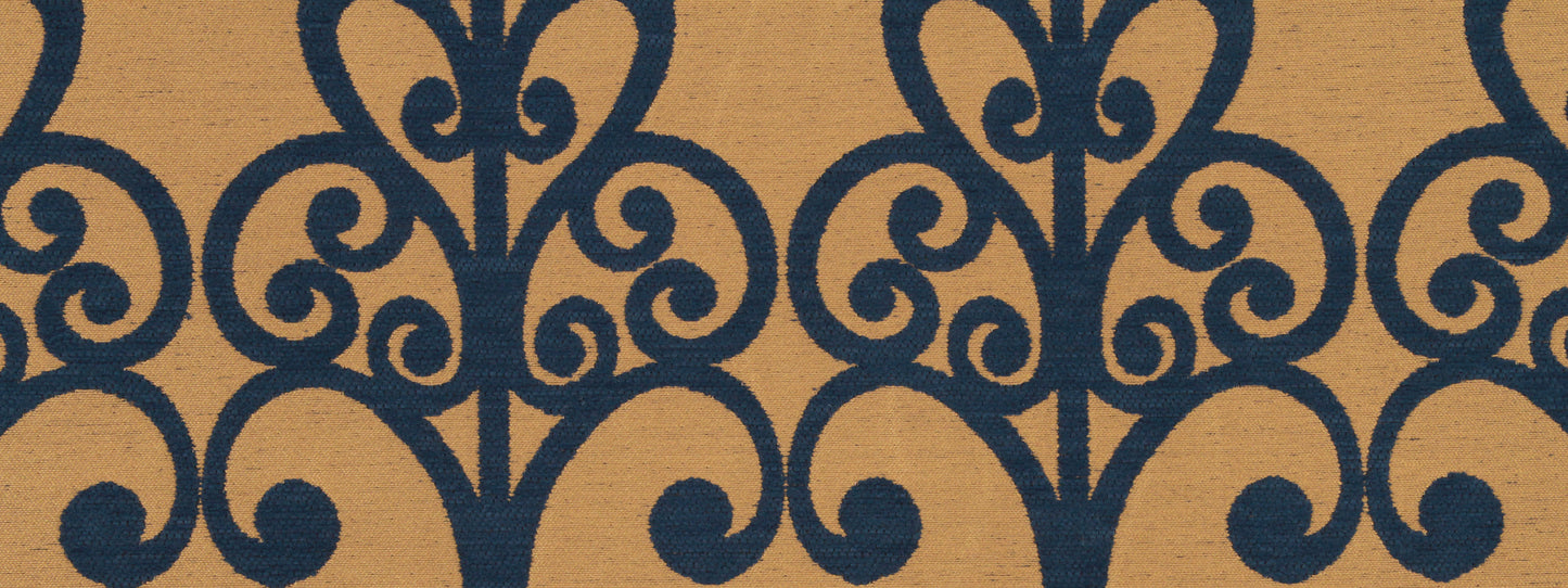 Intricate dark blue scrollwork arabesque pattern on warm tan background; classic upholstery fabric design.