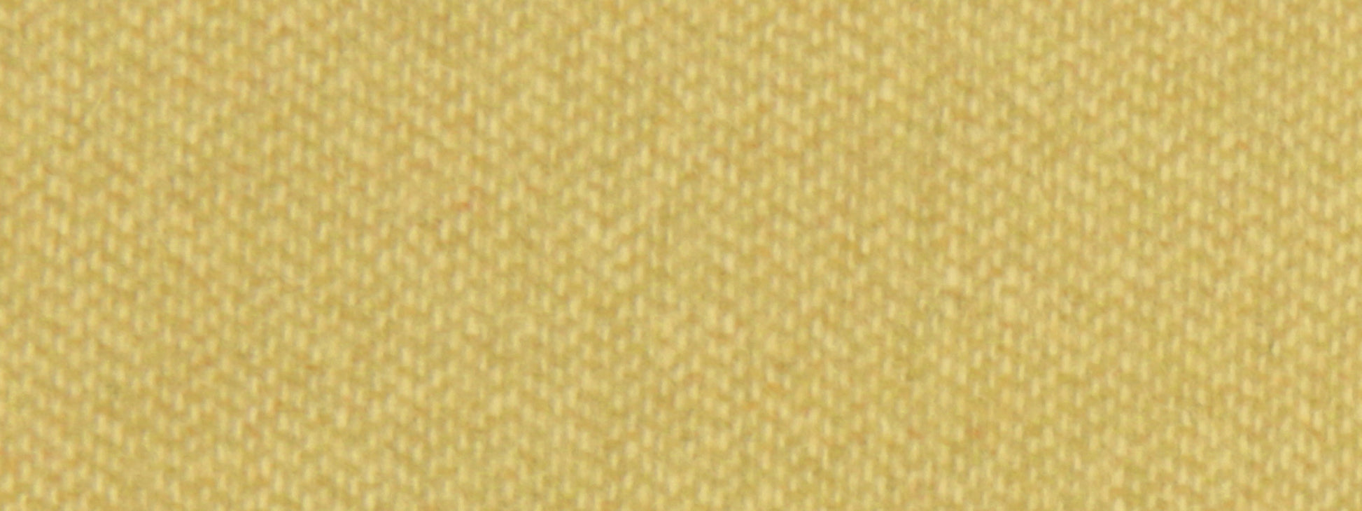 Close-up of chartreuse wool upholstery fabric with a tight weave; warm yellow-green fibers create a rich woven texture.
