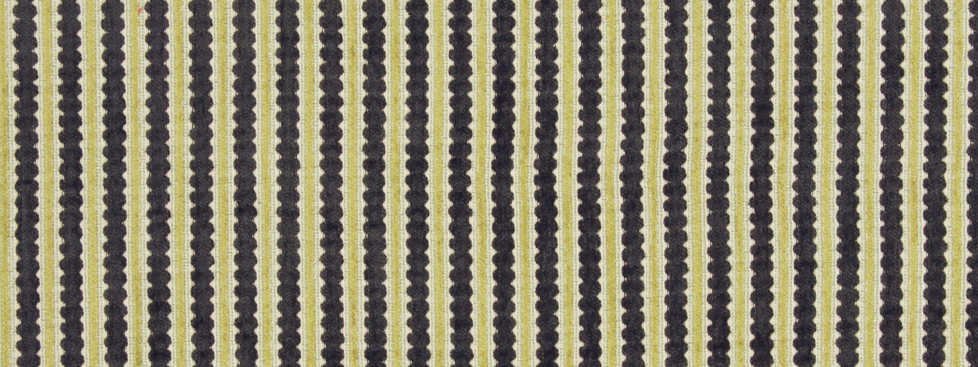 Navy blue dot pattern forming vertical stripes on beige upholstery fabric; vintage geometric textile.