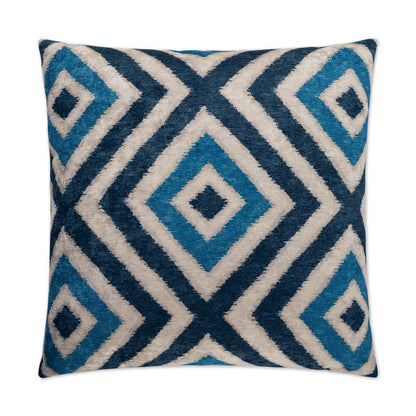 Square decorative pillow with navy, sky blue and white diamond geometric pattern on plush textured fabric.