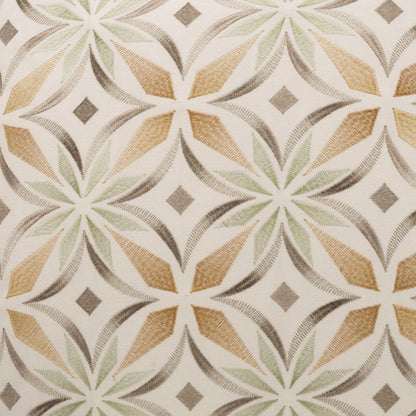 Textured fabric with repeating circular rosette pattern in cream, beige, sage green and taupe; small diamonds between stars.