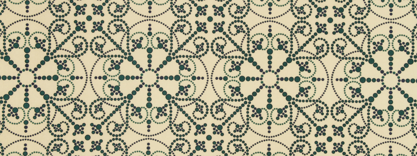 Beige fabric with a teal dotted pattern.