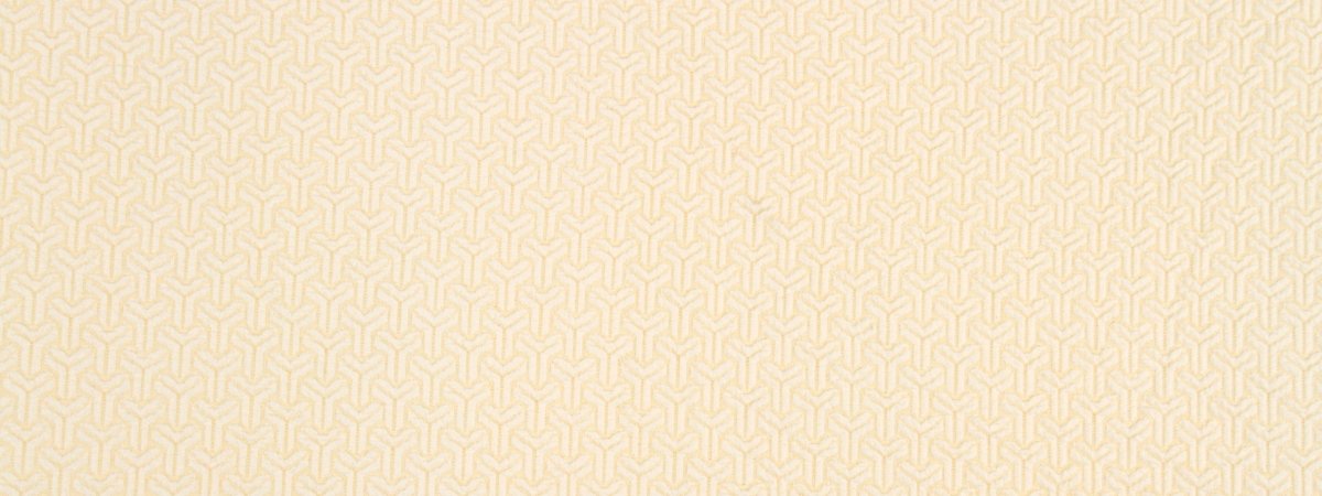 Beige upholstery fabric with a subtle repeating geometric lattice pattern.