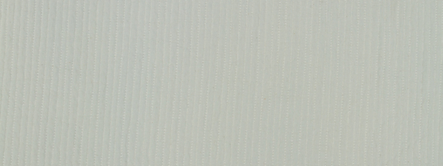 Close-up of blue opal upholstery fabric with fine vertical ribbing and soft texture.