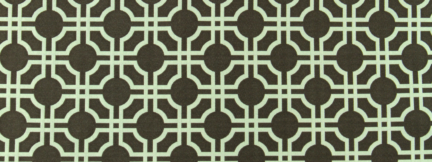 Dark brown background with beige interlocking circle lattice pattern; retro geometric upholstery fabric print.
