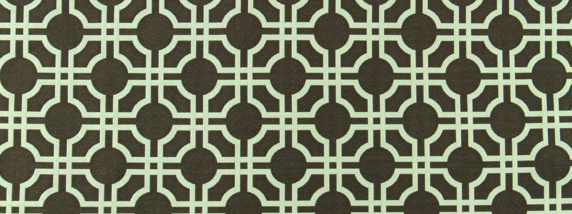 Dark brown background with beige interlocking circle lattice pattern; retro geometric upholstery fabric print.