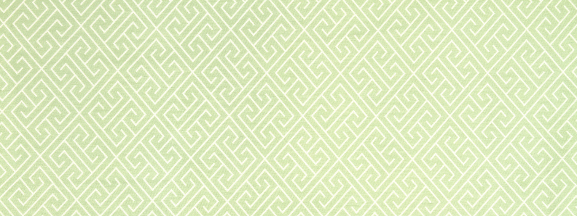 Pale lime-green Greek-key geometric upholstery fabric.